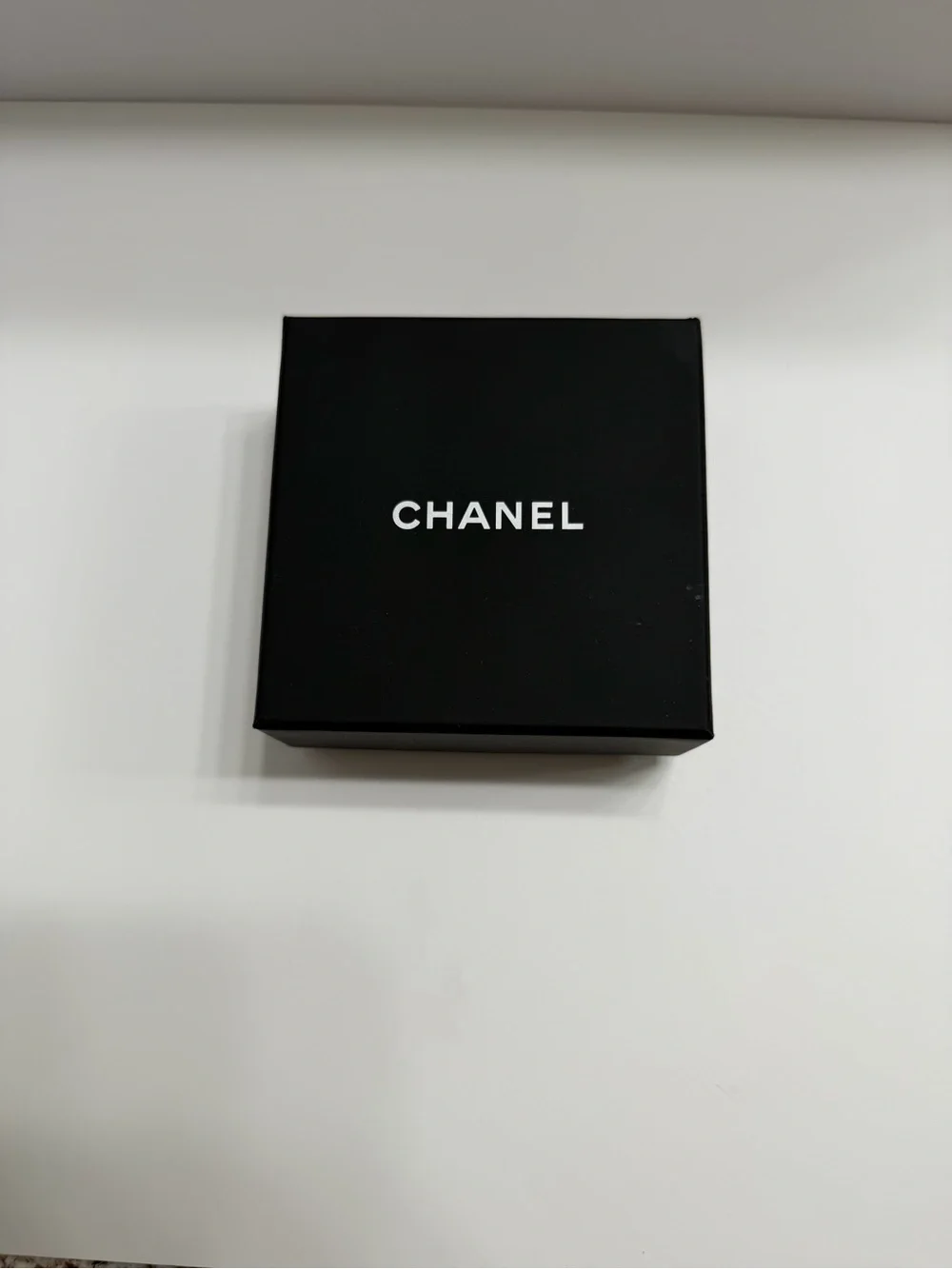 Chanel 2025  Strass Star and Logo Silver Tone and Crystal Hoop Earrings